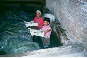 Workers Using Gloves and Shoes